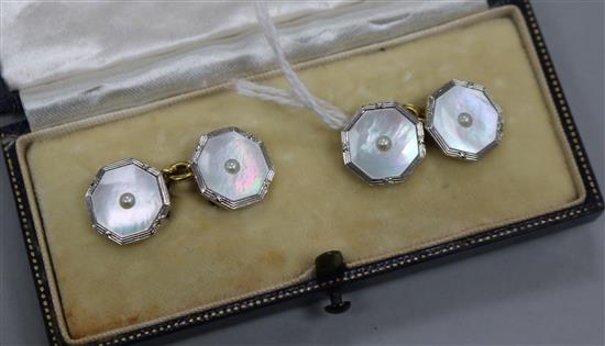 A pair of 18ct gold, platinum and mother of pearl octagonal cufflinks.